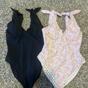 Dippin' Daisy's Black and Floral Pink One Piece Swimsuits